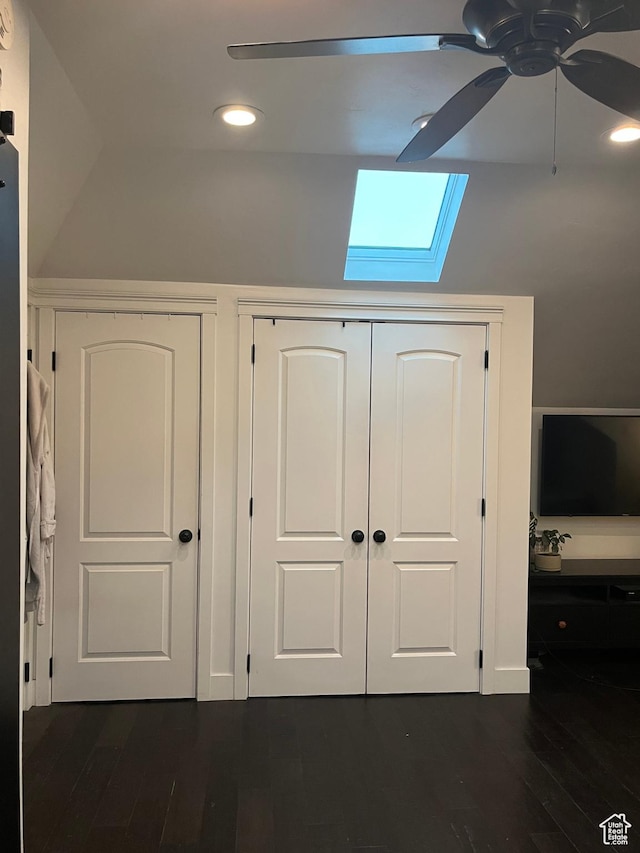 detailed view of a skylight, ceiling fan, wood finished floors, and recessed lighting