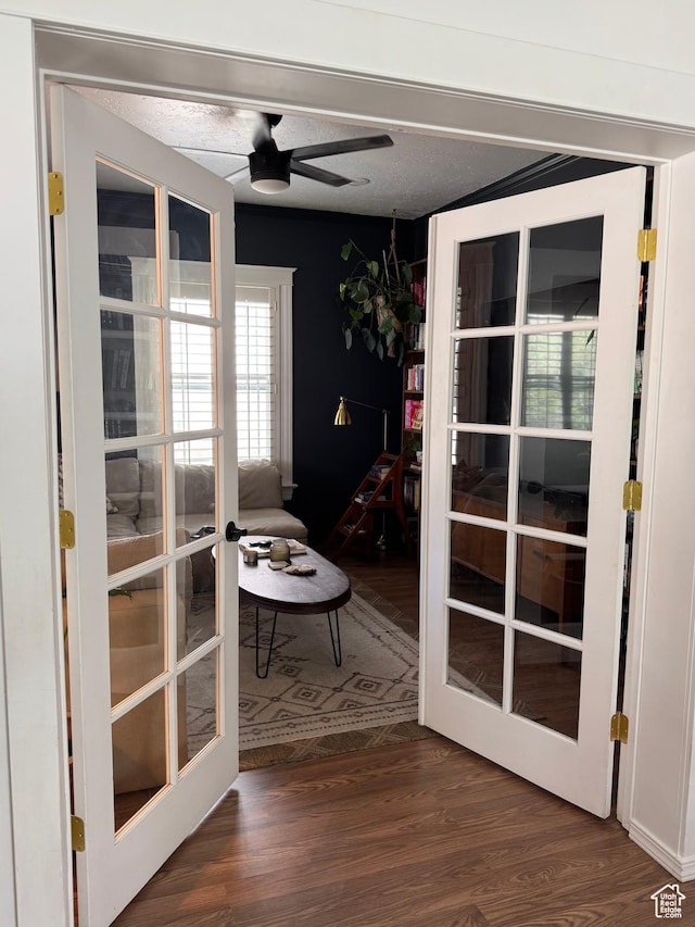 doorway to outside with french doors, wood finished floors, and ceiling fan