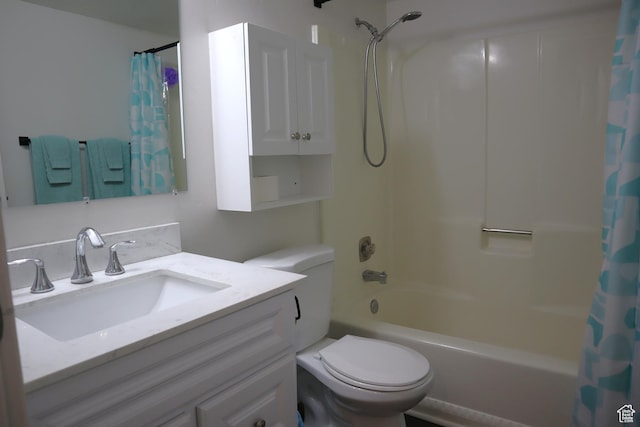 bathroom with shower / bathtub combination with curtain, toilet, and vanity