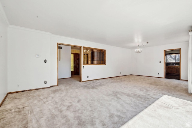 720 N 300 E, Tremonton, UT 84337 - spare room featuring a chandelier, carpet, baseboards, and ornamental molding