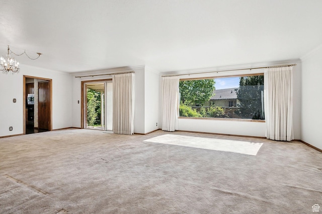720 N 300 E, Tremonton, UT 84337 - carpeted spare room with a chandelier, baseboards, and ornamental molding