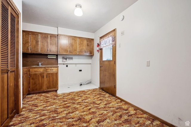 720 N 300 E, Tremonton, UT 84337 - laundry area featuring cabinet space, hookup for a washing machine, electric dryer hookup, and baseboards