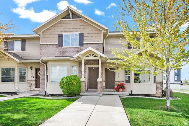 490 E 700 S Unit 514, Clearfield, UT 84015 - view of front of property with a front lawn and brick siding