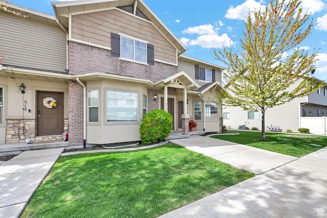 490 E 700 S Unit 514, Clearfield, UT 84015 - multi unit property with brick siding and a front lawn
