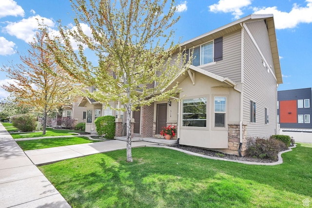 490 E 700 S Unit 514, Clearfield, UT 84015 - view of front of home with a front lawn