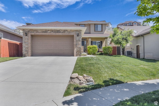 1828 W Woodview Dr, Lehi, UT 84043 - view of front of house featuring stone siding, an attached garage, concrete driveway, central AC unit, and stucco siding