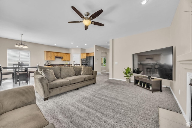 1828 W Woodview Dr, Lehi, UT 84043 - living area with a ceiling fan, arched walkways, a chandelier, baseboards, and recessed lighting