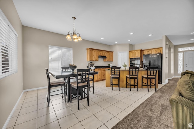 1828 W Woodview Dr, Lehi, UT 84043 - dining area featuring healthy amount of natural light, a chandelier, baseboards, light tile patterned floors, and recessed lighting