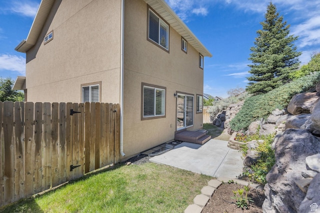 1828 W Woodview Dr, Lehi, UT 84043 - back of house featuring a patio and stucco siding
