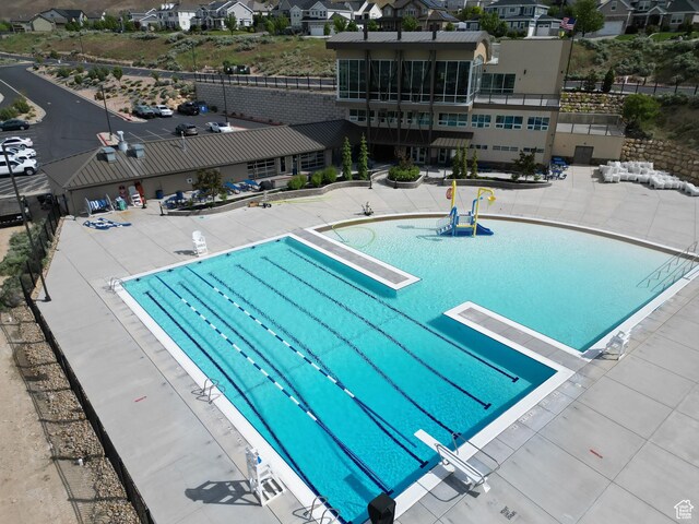 1828 W Woodview Dr, Lehi, UT 84043 - community pool featuring a diving board and a residential view