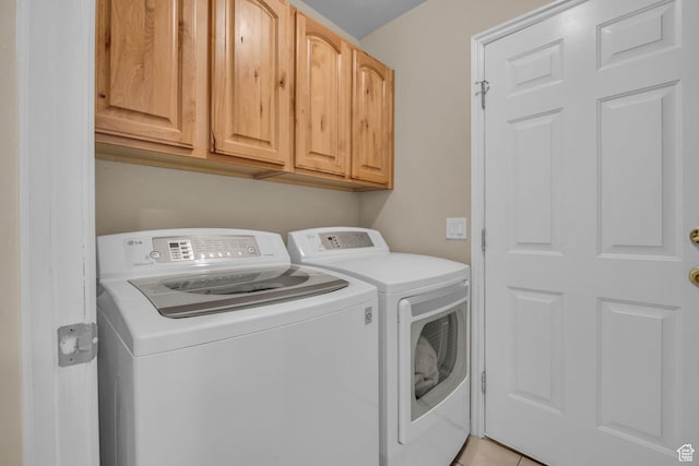 1828 W Woodview Dr, Lehi, UT 84043 - laundry room with independent washer and dryer, cabinet space, and light tile patterned floors
