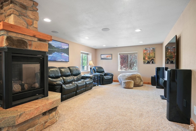 8127 S Bear Lake Ct, West Jordan, UT 84081 - carpeted living area with a stone fireplace and recessed lighting