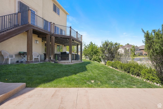 8127 S Bear Lake Ct, West Jordan, UT 84081 - view of grassy yard featuring a patio and a balcony