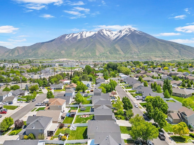 aerial perspective of suburban area featuring a mountain backdrop