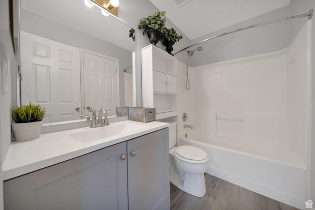175 E Wayfield Dr S, Draper, UT 84020 - full bathroom featuring vanity, toilet, wood finished floors, and shower / bath combination