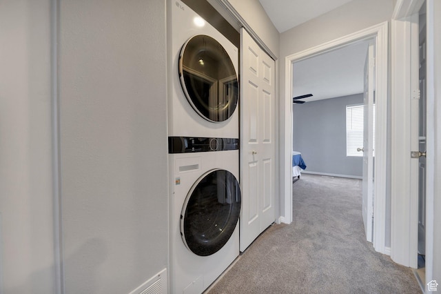 175 E Wayfield Dr S, Draper, UT 84020 - laundry room with stacked washer / drying machine, carpet floors, and baseboards