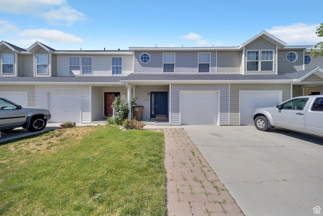 175 E Wayfield Dr S, Draper, UT 84020 - townhome / multi-family property featuring driveway, an attached garage, and a front lawn