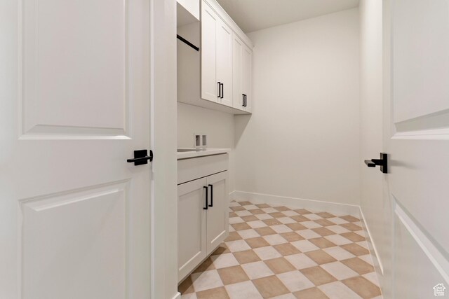 4845 W 2020 S, Hurricane, UT 84737 - laundry room with cabinet space, washer hookup, and baseboards
