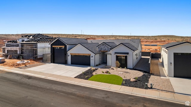 4845 W 2020 S, Hurricane, UT 84737 - modern inspired farmhouse with a garage, driveway, stucco siding, and fence