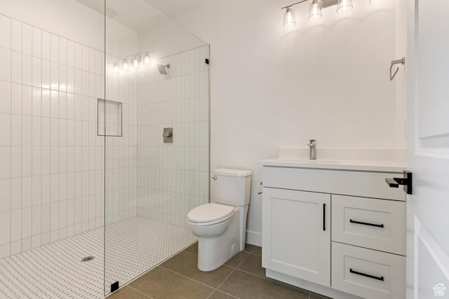 4845 W 2020 S, Hurricane, UT 84737 - full bath featuring tiled shower, vanity, tile patterned flooring, and toilet