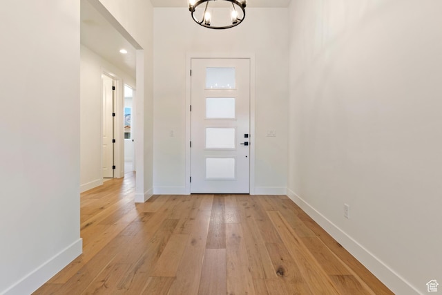4845 W 2020 S, Hurricane, UT 84737 - entrance foyer with a chandelier, light wood finished floors, and baseboards