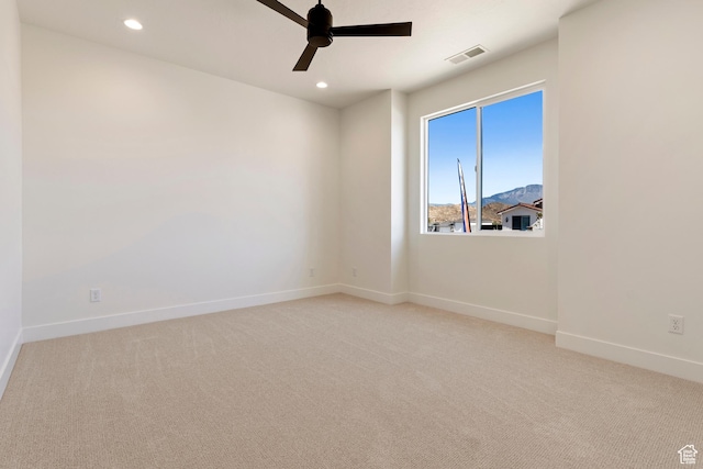 4845 W 2020 S, Hurricane, UT 84737 - spare room featuring carpet flooring, baseboards, a ceiling fan, and recessed lighting
