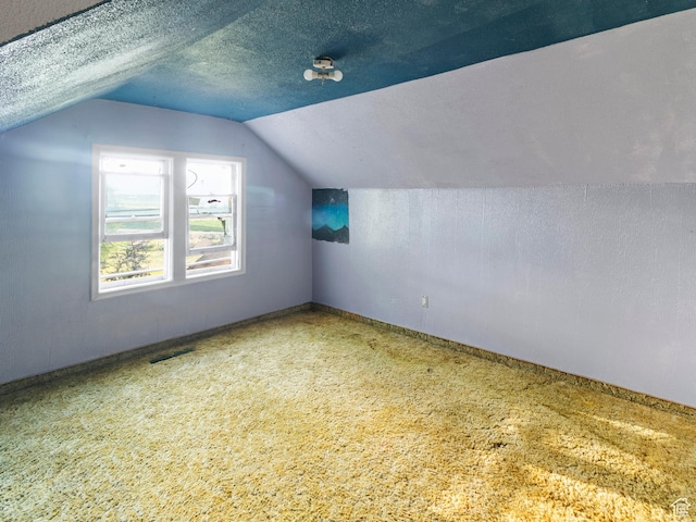 10045 W 12000 N, Bothwell, UT 84337 - bonus room with lofted ceiling, a textured ceiling, and baseboards