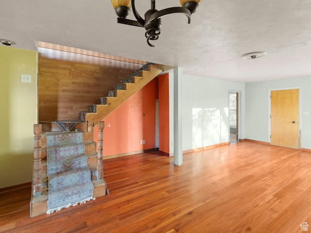 10045 W 12000 N, Bothwell, UT 84337 - staircase featuring wood finished floors and baseboards