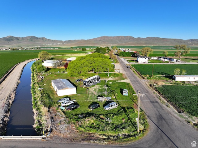 10045 W 12000 N, Bothwell, UT 84337 - aerial overview of property's location featuring rural landscape and a water and mountain view