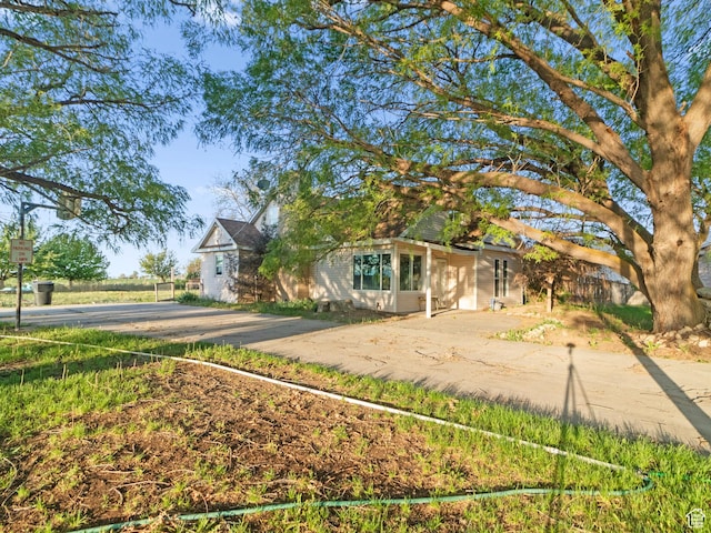 10045 W 12000 N, Bothwell, UT 84337 - view of front of home with driveway