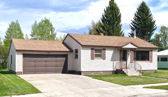 271 S Court St W, Soda Springs, ID 83276 - ranch-style house with a front lawn, a garage, driveway, and a chimney