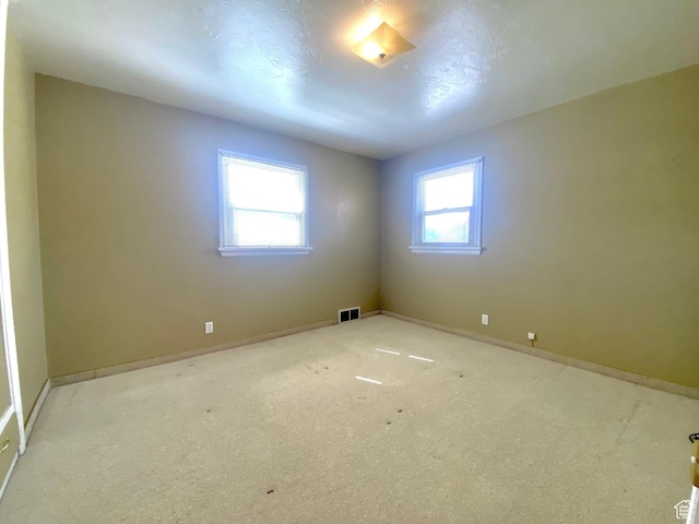 271 S Court St W, Soda Springs, ID 83276 - carpeted spare room featuring baseboards