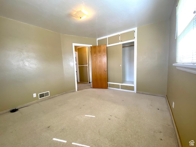 271 S Court St W, Soda Springs, ID 83276 - unfurnished bedroom featuring carpet flooring, a closet, and baseboards