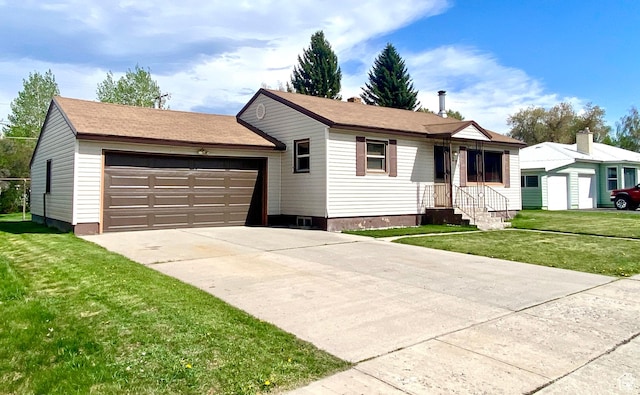 271 S Court St W, Soda Springs, ID 83276 - ranch-style home featuring a front lawn, an attached garage, and driveway