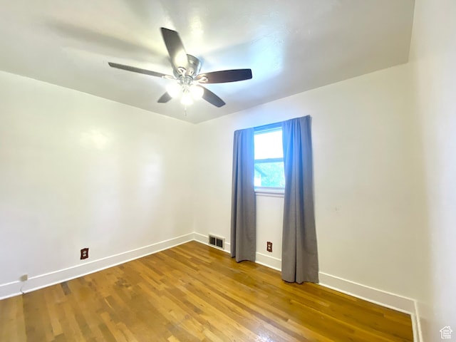 271 S Court St W, Soda Springs, ID 83276 - empty room with baseboards, a ceiling fan, and wood finished floors