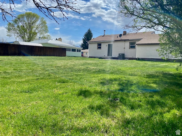 271 S Court St W, Soda Springs, ID 83276 - rear view of house with central AC and a yard