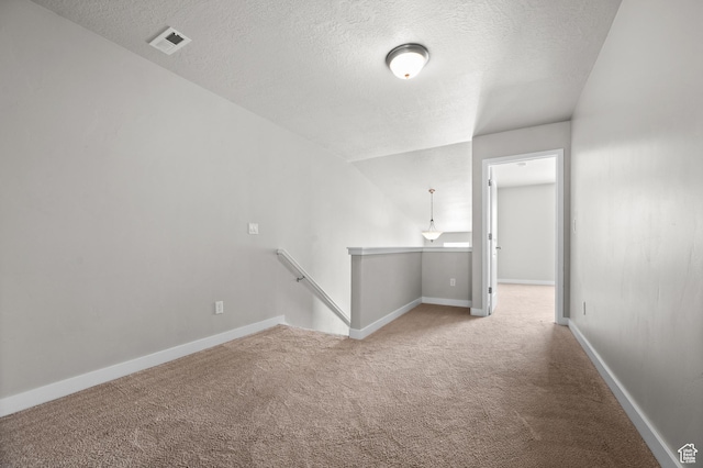 6616 W 7735 S, West Jordan, UT 84081 - carpeted spare room with a textured ceiling and baseboards