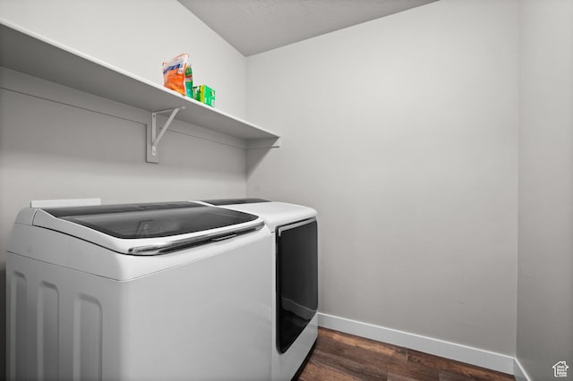 6616 W 7735 S, West Jordan, UT 84081 - clothes washing area with washing machine and dryer, dark wood-type flooring, and baseboards