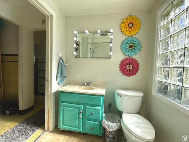 half bath with vanity and toilet
