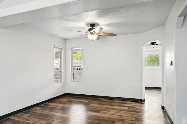 710 W 1350 S, Cedar City, UT 84720 - unfurnished room featuring plenty of natural light, dark wood-style floors, ceiling fan, and a textured ceiling