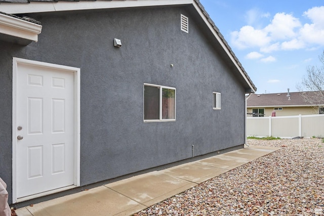 710 W 1350 S, Cedar City, UT 84720 - view of home's exterior featuring fence and stucco siding