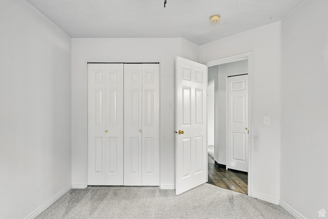 710 W 1350 S, Cedar City, UT 84720 - unfurnished bedroom featuring baseboards, carpet flooring, and a closet
