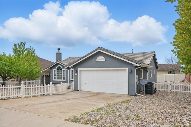 710 W 1350 S, Cedar City, UT 84720 - single story home with a garage, a chimney, driveway, stucco siding, and a tiled roof