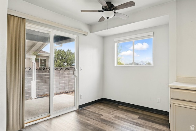710 W 1350 S, Cedar City, UT 84720 - unfurnished dining area featuring wood finished floors, a ceiling fan, and baseboards