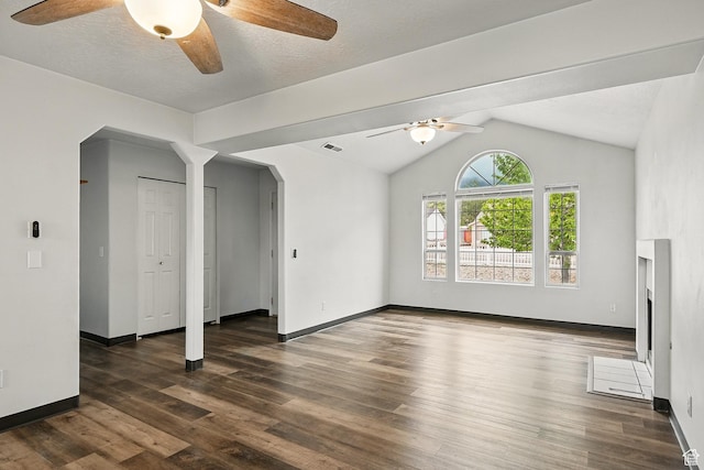 710 W 1350 S, Cedar City, UT 84720 - unfurnished living room with arched walkways, a ceiling fan, wood finished floors, lofted ceiling, and baseboards