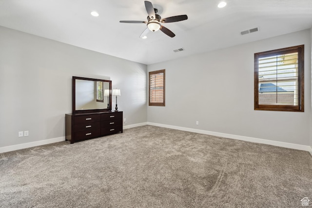 3335 W 2570 S, Hurricane, UT 84737 - unfurnished bedroom featuring multiple windows, recessed lighting, light carpet, and baseboards
