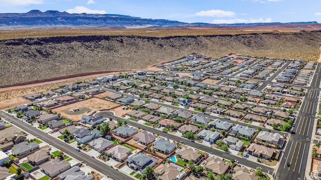 3335 W 2570 S, Hurricane, UT 84737 - aerial overview of property's location featuring a mountain backdrop and nearby suburban area
