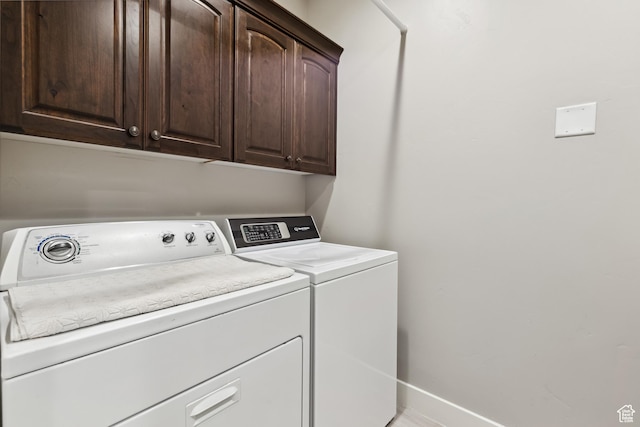 3335 W 2570 S, Hurricane, UT 84737 - laundry area featuring washing machine and dryer, cabinet space, and baseboards