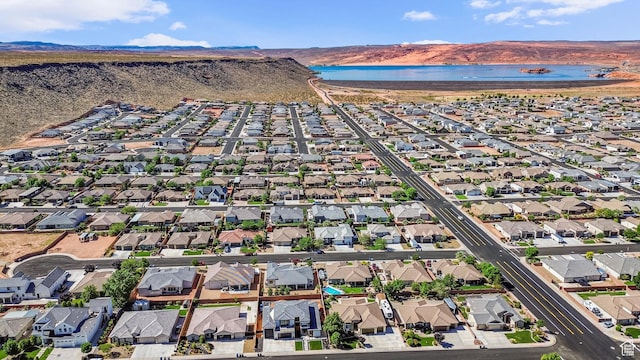 3335 W 2570 S, Hurricane, UT 84737 - aerial overview of property's location with a water and mountain view and nearby suburban area