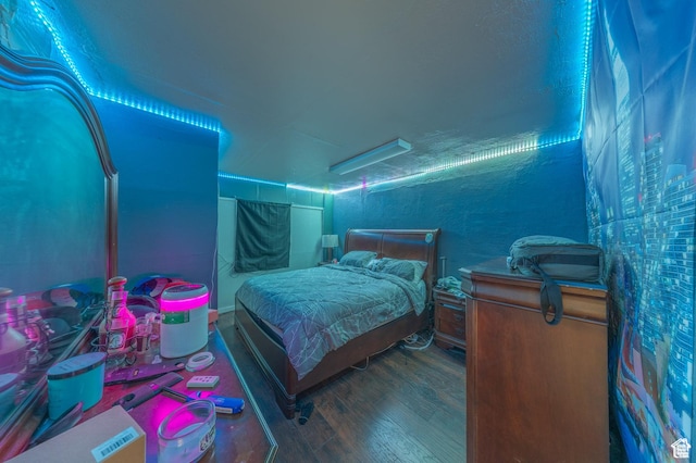 bedroom featuring wood finished floors